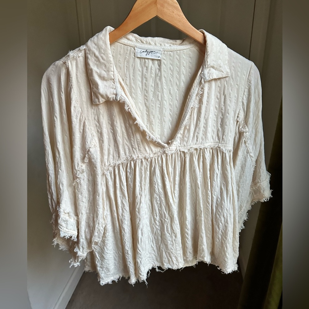 Carly Jean Los Angeles Raw Hem Cream Blouse